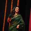 Shraddha Kapoor hugs Asha Bhosale at an awards ceremony in Pune