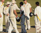Match draw after Ojha, Rayudu star with bat