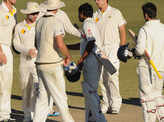 Match draw after Ojha, Rayudu star with bat