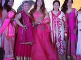 Cancer survivors walk the ramp on World Cancer Day