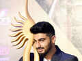 Arjun Kapoor poses with a trophy Photogallery - Times of India