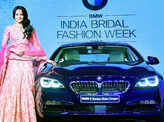 Sonakshi Sinha poses next to the newly launched BMW 6 Series Gran Coupe Photogallery - Times of India