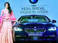 Sonakshi Sinha poses next to the newly launched BMW 6 Series Gran Coupe Photogallery - Times of India