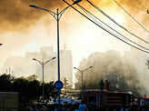 Smoke is seen near Dahongmen Bridge