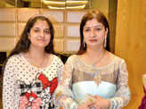 Vaishali and Sapna pose during a party