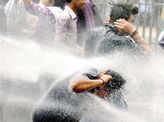 AAP workers being water-cannoned while crossing the barricades