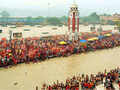 Devotees carrying kanwads wait to carry Ganga jal