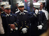 Firefighters attend a ceremony at the Fire Department of New York headquarters