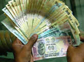 Rupee down on strong dollar demand