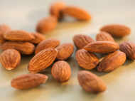 Snack on almonds to control cravings