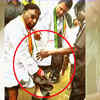 Article image for: Former minister holds slippers for Rahul Gandhi
