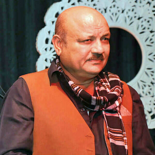 Arun Bakshi Photos