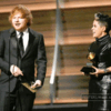 Ed Sheeran accepts the award for Song of the Year for 'Thinking Out Loud' with songwriter Amy Wadge