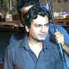 Article image for: Nawazuddin enjoys street food during '<i class="tbold">raman raghav</i> 2.0' promotions