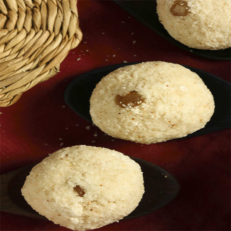 Coconut Rava Ladoos Recipe: How to Make Coconut Rava Ladoos Recipe |  Homemade Coconut Rava Ladoos Recipe