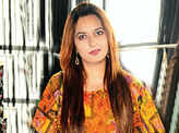 Socialites attend an exhibition