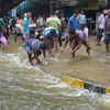 Article image for: Watch: People catch fish, snake as floodwater inundates streets in Bengaluru