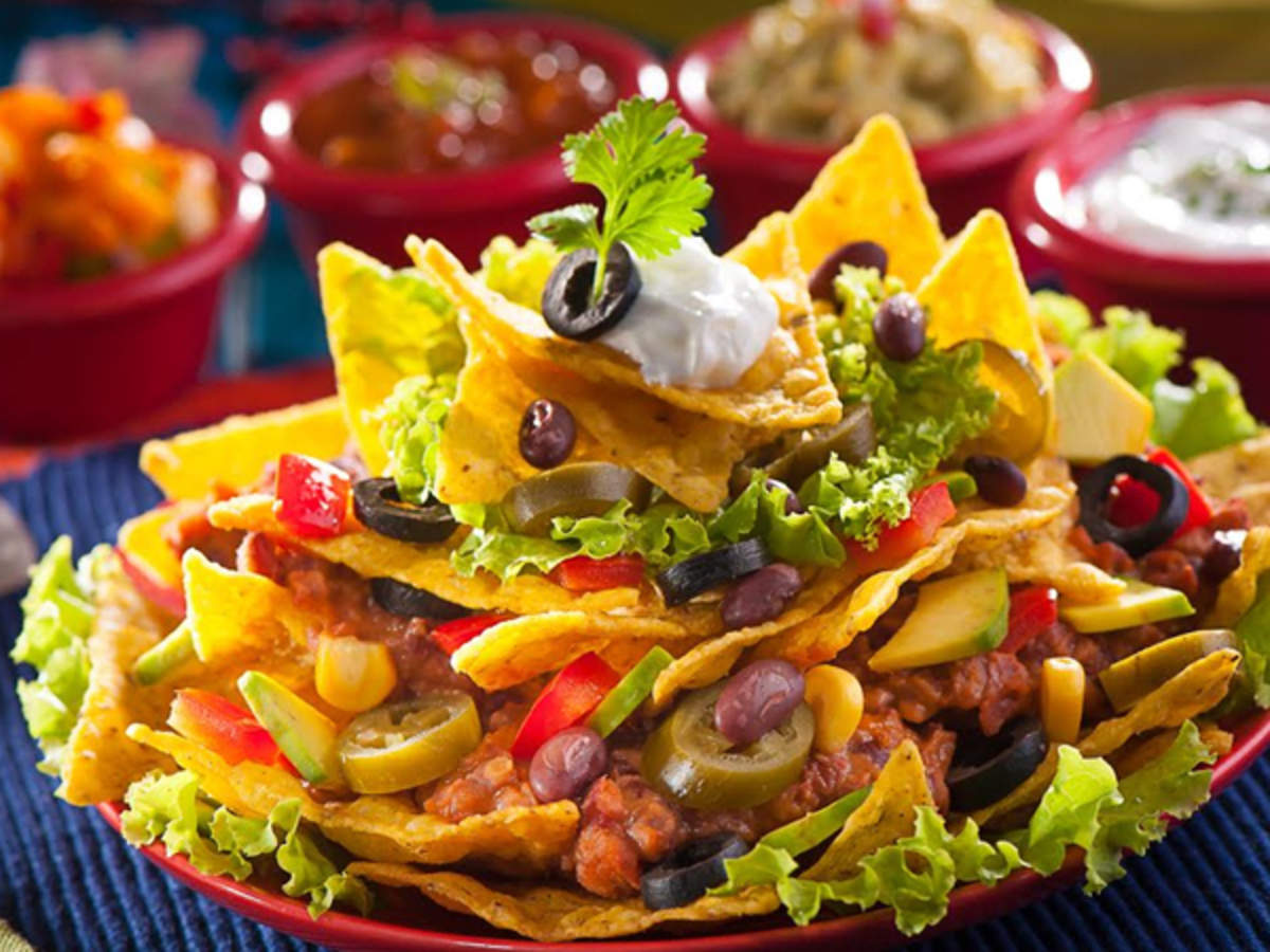 Loaded Nachos with Refried Beans Recipe: How to Make Loaded Nachos with  Refried Beans Recipe | Homemade Loaded Nachos with Refried Beans Recipe