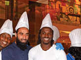 Chennaiyin FC players attend cake-mixing event