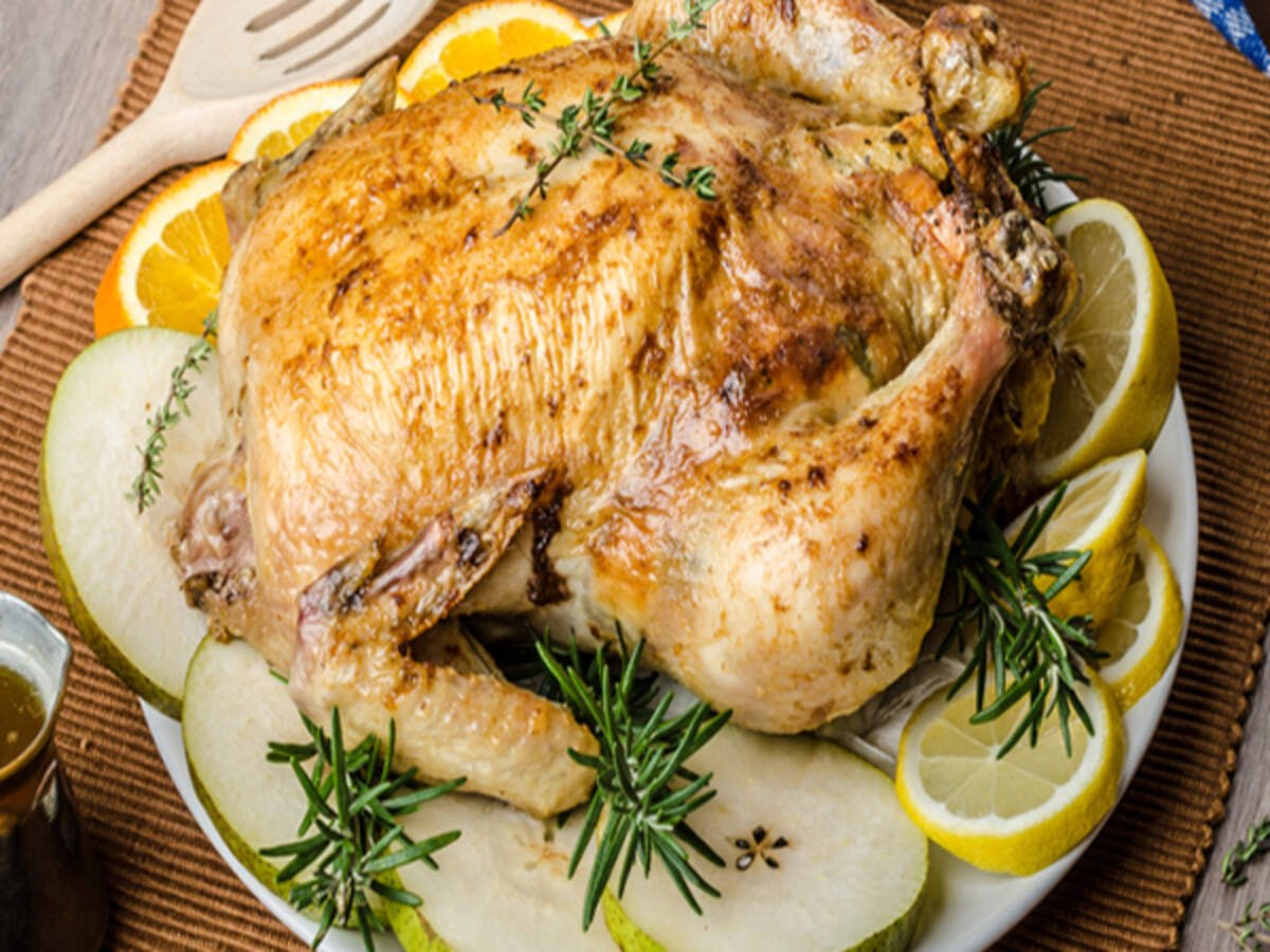 Roast Chicken with Stuffing Recipe: How to make Roast Chicken with Stuffing Recipe at Home | Homemade Roast Chicken with Stuffing Recipe - Times Food