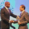 ​Times Group MD Vineet Jain shakes hands with Olympic legend Carl Lewis