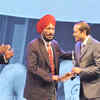 ​Times Group MD Vineet Jain honours legendary Milkha Singh