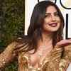 Priyanka Chopra nails the red carpet look, goes glam in golden at Golden Globes 2017