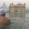 Article image for: Devotees take holy dip at Golden Temple to ring in Makar Sankranti