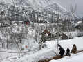 Rains, fresh snowfall throw life out of gear in J&K