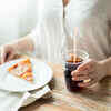 Cold drink with cheesy food