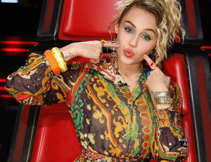 Singer Miley Cyrus performs Lakshmi puja