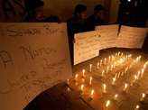 Photo story: IS suicide bombing at Pakistan shrine kills 75