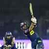 Article image for: <i class="tbold">Herschelle Gibbs</i> of DC hits a boundary watched by Naman Ojha