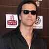 Article image for: Is Hrithik hiding a bad <i class="tbold">hair</i> cut with his cap?