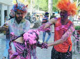 Photos: Holi revelry takes happy, ugly hues
