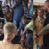 Justin Bieber interacts with underprivileged children and hands them 100 passes for his concert