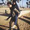 Pic: Daniel Weber gives Sunny Leone a piggyback ride