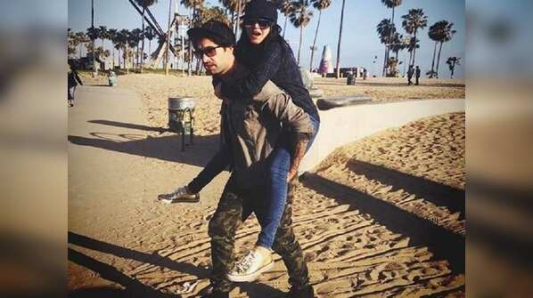 Pic: Daniel Weber gives Sunny Leone a piggyback ride
