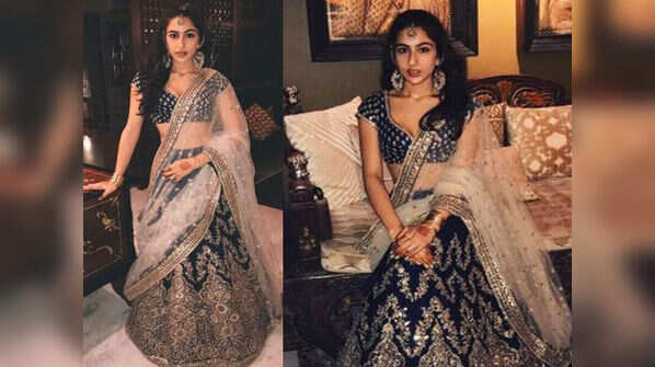She poses in the most royal way!
