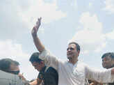 ​Rahul Gandhi waves to his supporters at Naya Gaon