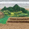 Yoga Day sculpture in Peru by sand artist Sudarsan Pattnaik