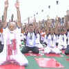 PM Modi performing yoga with thousands of participants in Lucknow