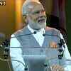 Prime Minister Narendra Modi is welcomed with a loud cheer as he addresses the Indian community, in Sportcampus Zuiderpark at The Hague