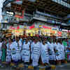 Women wearing aprons bearing anti-GST messages attend a protest organised by Congress against implementation of GST