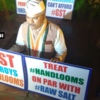 Congress Rajya Sabha MP from Telangana Ananda Bhaskar Rapolu protesting against GST in front of the Gandhi statue in Parliament complex
