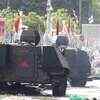 Article image for: Armoured vehicles enter protest zone in <i class="tbold">thailand</i>