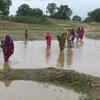 Article image for: UP: In absence of bridge, villagers risk their lives to cross river in Balrampur