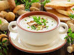 Creamy soup of mushrooms and buttered snails
