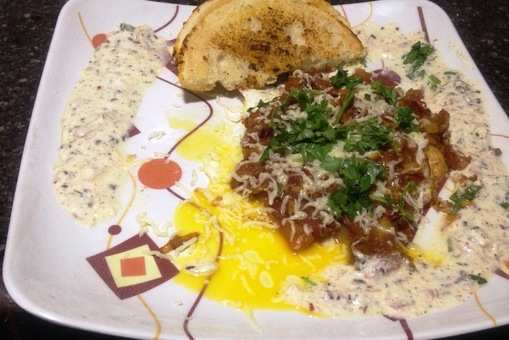 Half Fried Egg Sabji with Kulcha and Yoghurt Dip