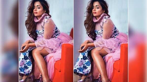 Stunning in thigh-high slit dress